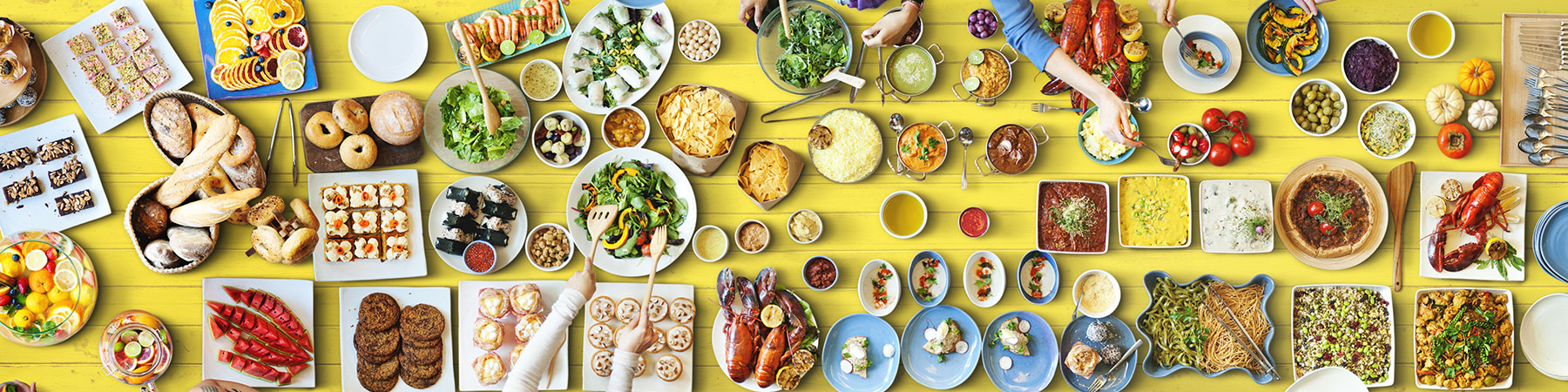 Yellow table filled with food