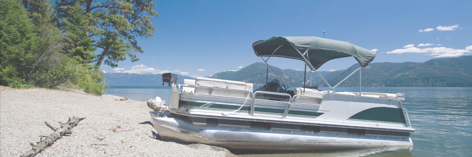 close-up of woman with travel bag using cell phone